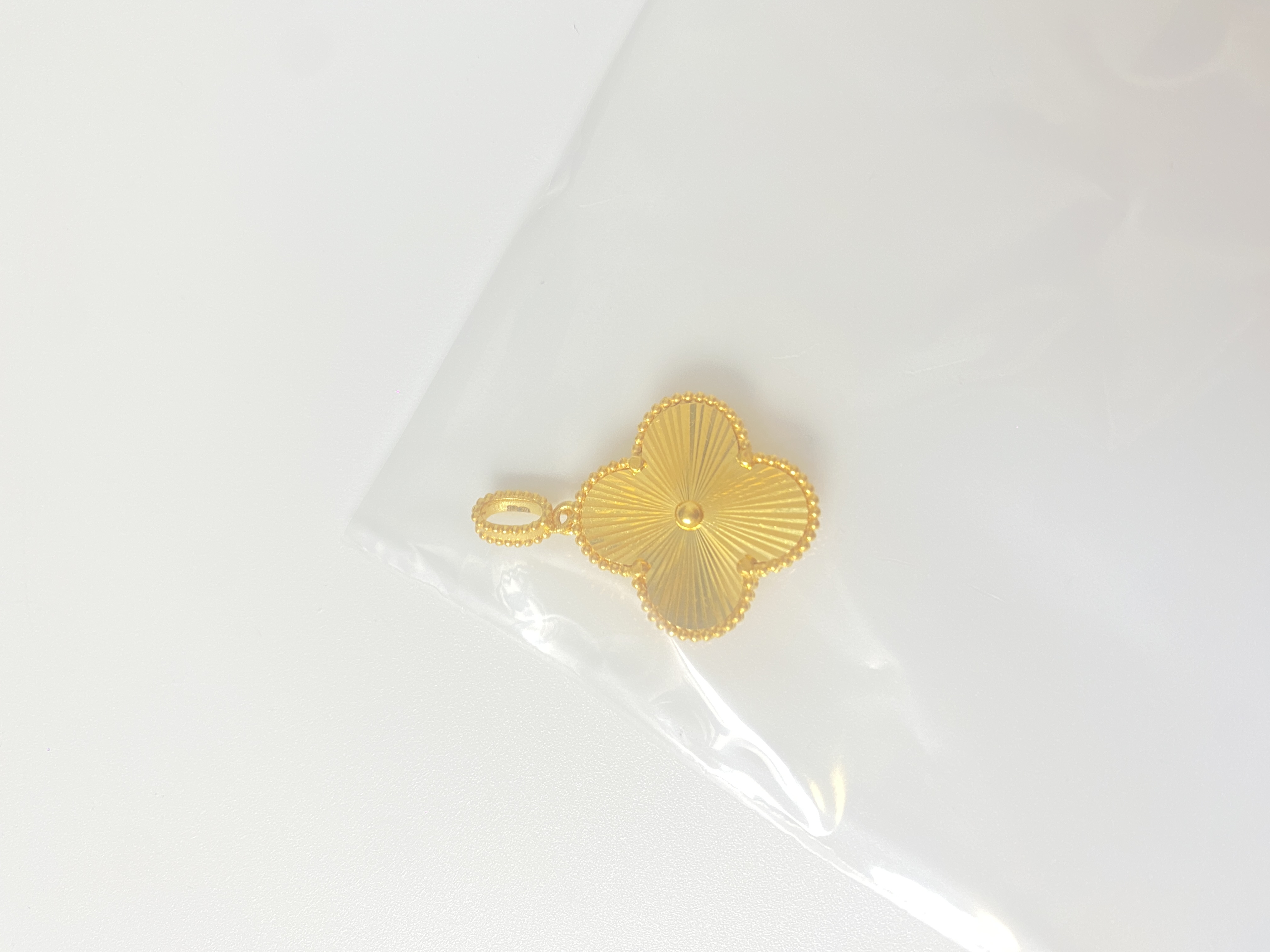足金999  大镭射珠边四叶草