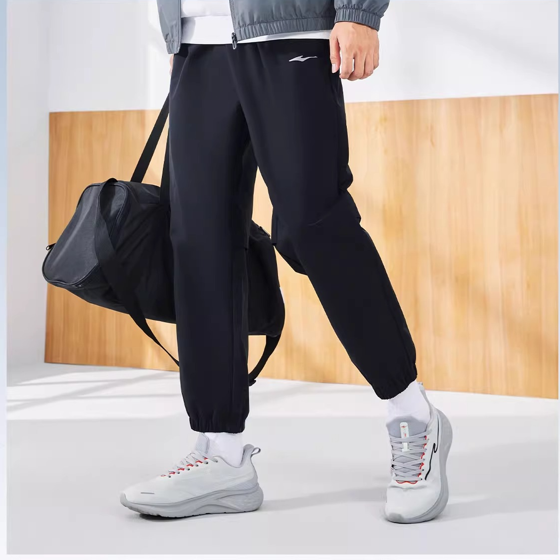 鸿星尔克防泼水 | 走秀款男子梭织速干跑步束脚九分裤长裤-2014