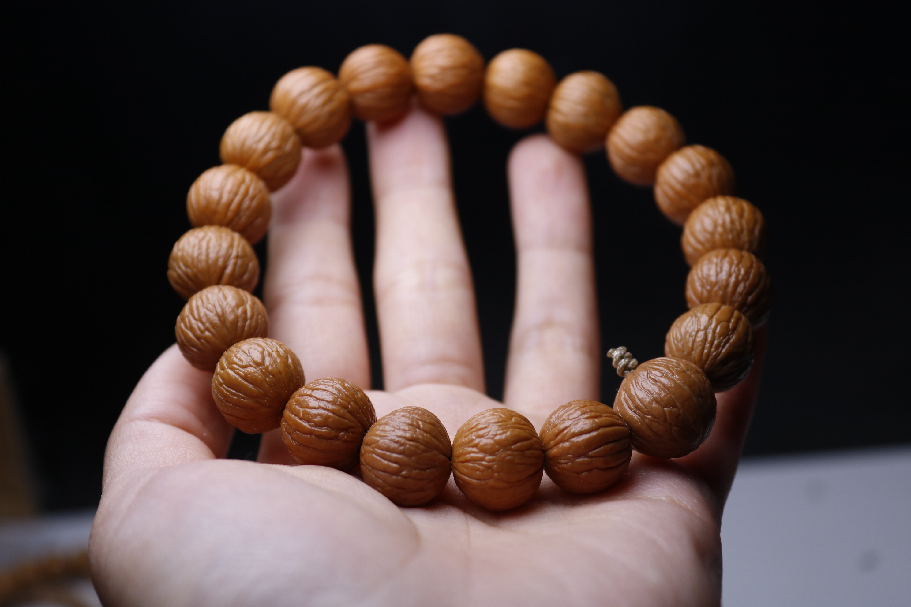 猴头核桃凤羽手串不同尺