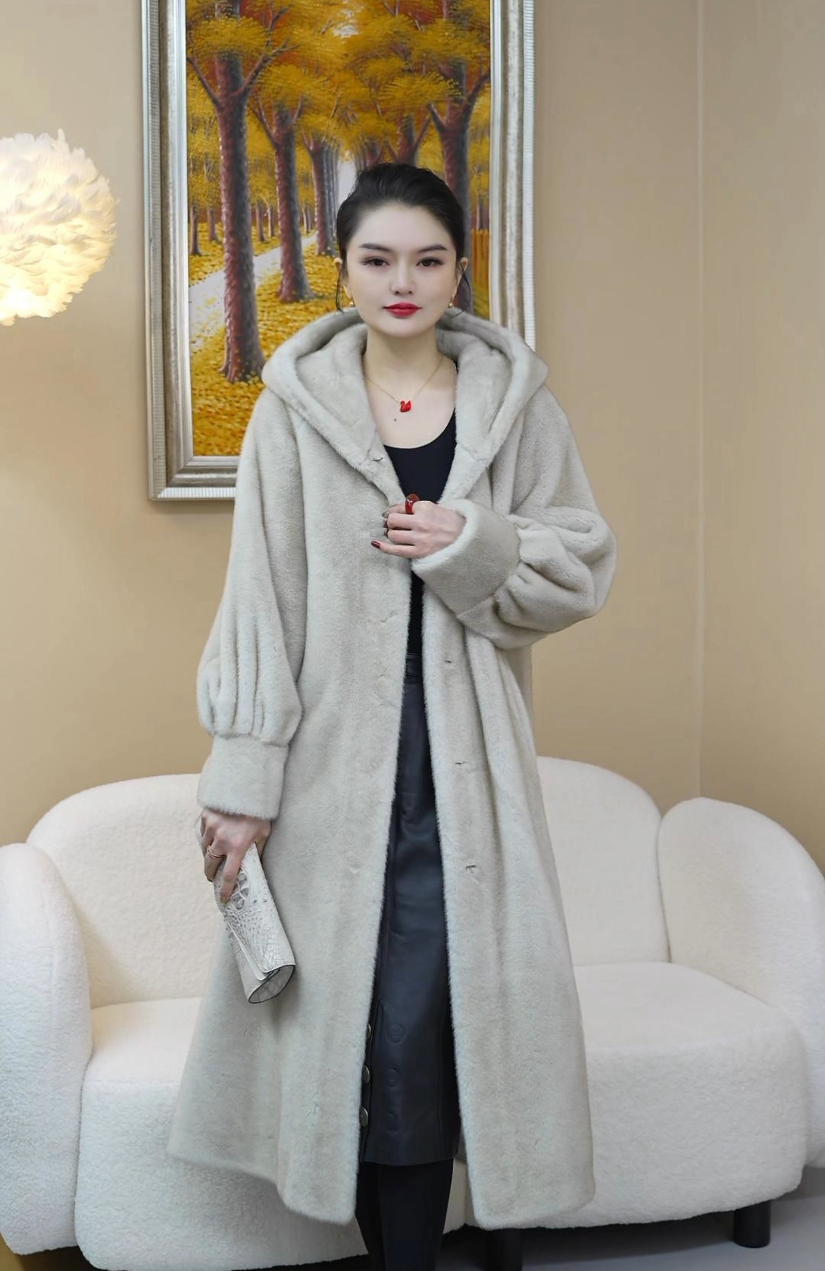 海宁冬季新款小狐貂中长款大衣女款连帽加长加厚保暖时尚加长外套