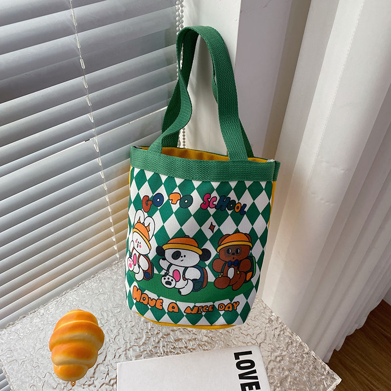 印花童趣水桶包ins日式便当袋圆筒包休闲手提帆布包少女心手拎袋