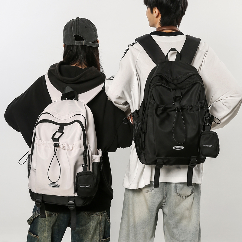 休闲潮酷书包女韩版男士百搭初中生高中大学生轻便减负背包双肩包