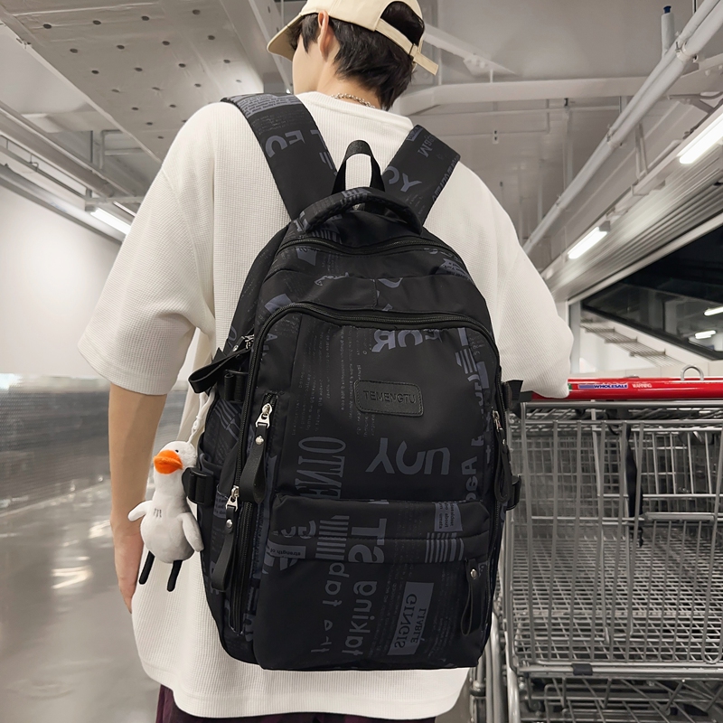 书包女韩版潮流百搭初中生高中大学生减负背包休闲男款轻便双肩包