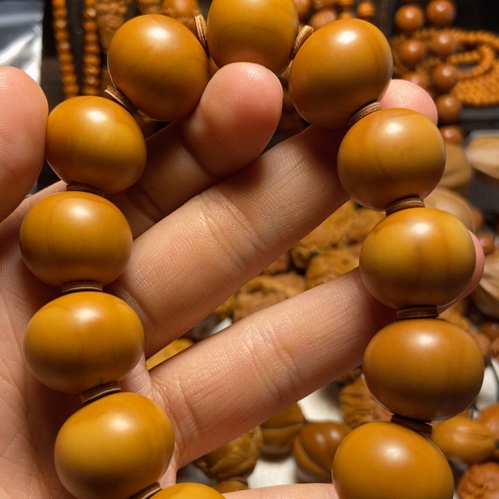 【闪购商品】橄榄核核雕漂****}苹果珠手串