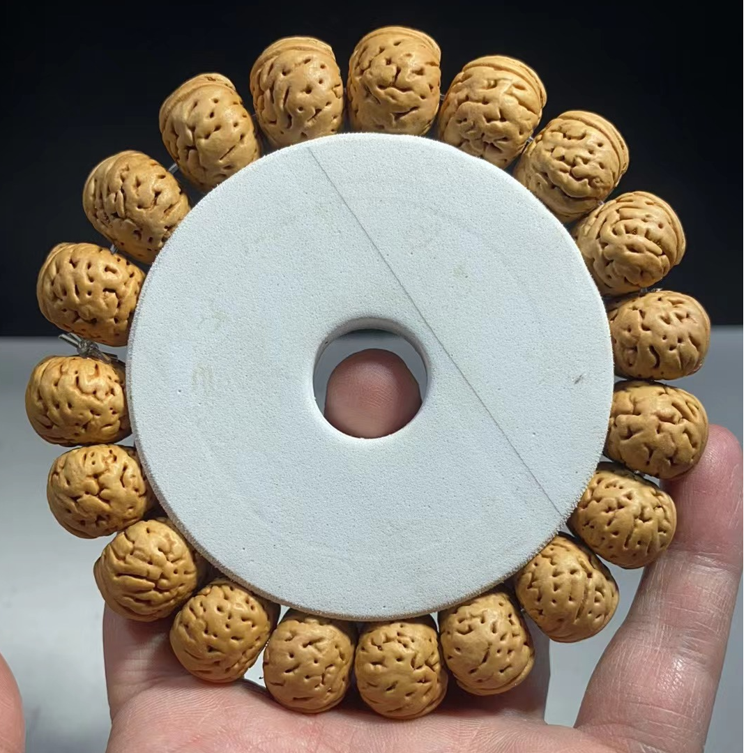 1.7（树王纽扣）桃核手串