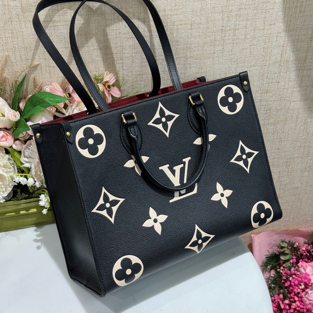 95新 LouisVuitton/路易威登 黑底白花onthego中号单肩包