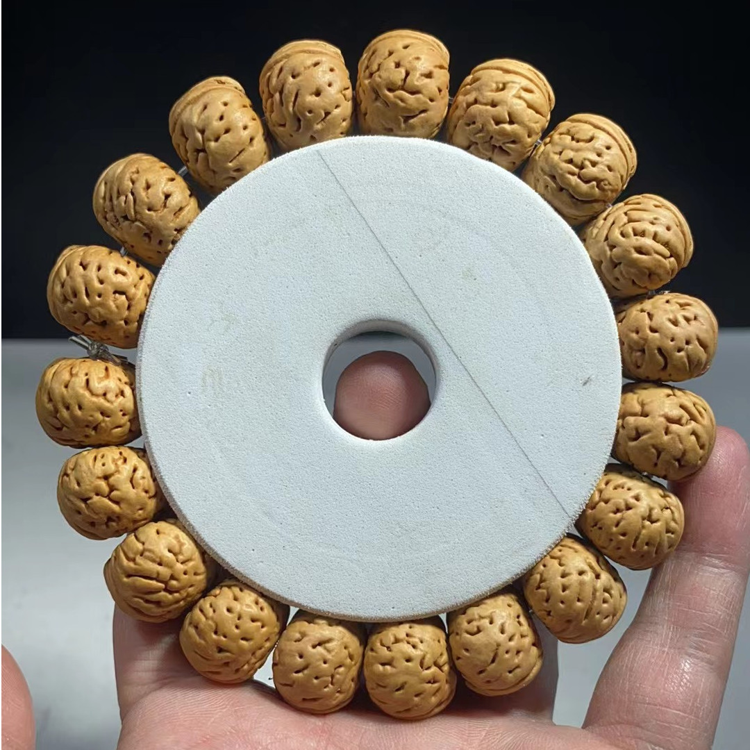 1.7（树王纽扣）桃核手串