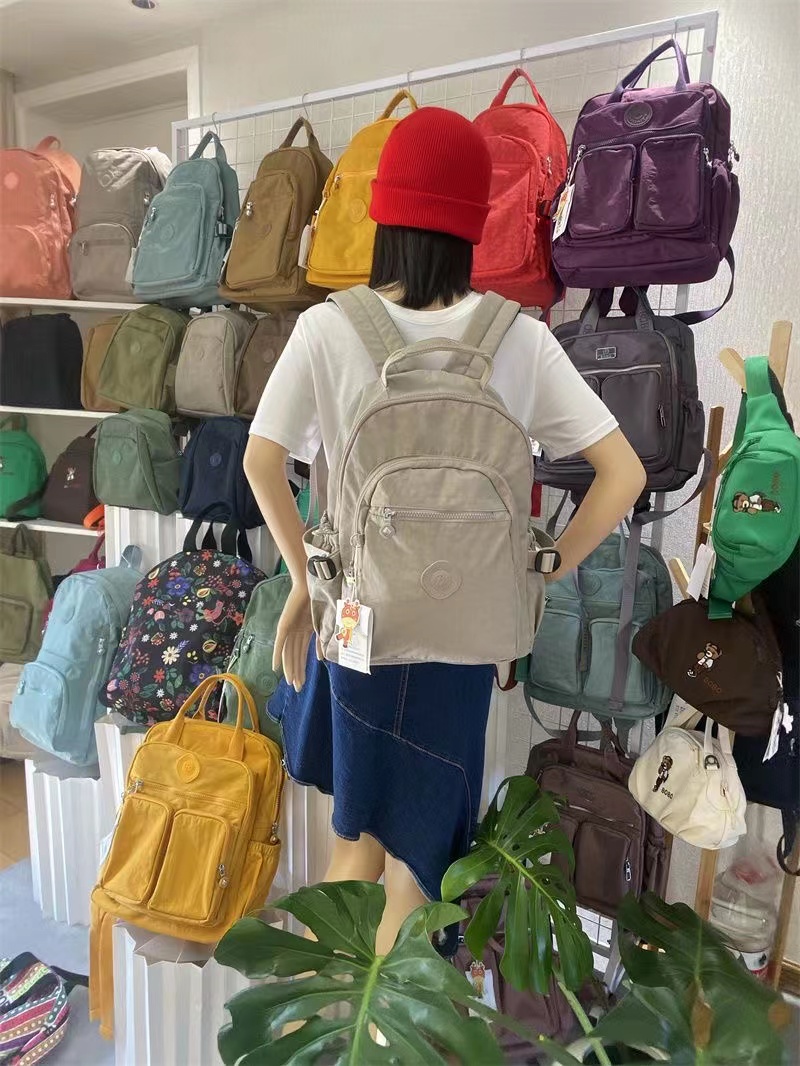 双肩包女大容量简约百搭轻便中号书包防水牛津布旅行背包14寸电脑