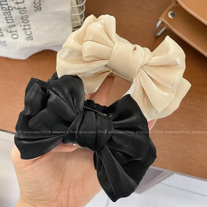 黑色蝴蝶结丸子头抓夹小号发夹后脑勺盘发神器高级感发卡夹子头饰