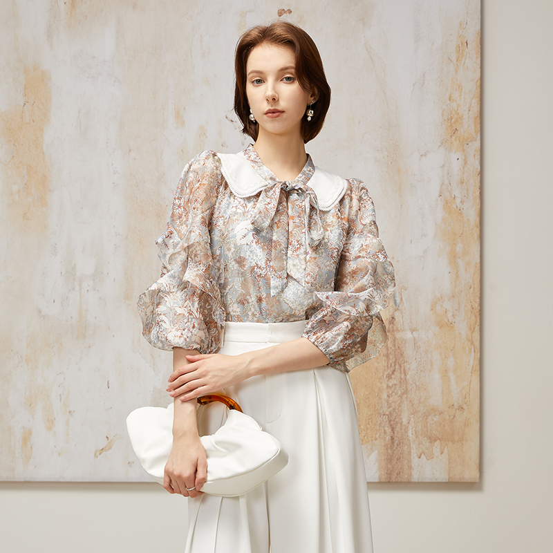 【粉丝专享】恩曼琳春季绣花娃娃领系带荷叶边印花雪纺衫EANEAH34