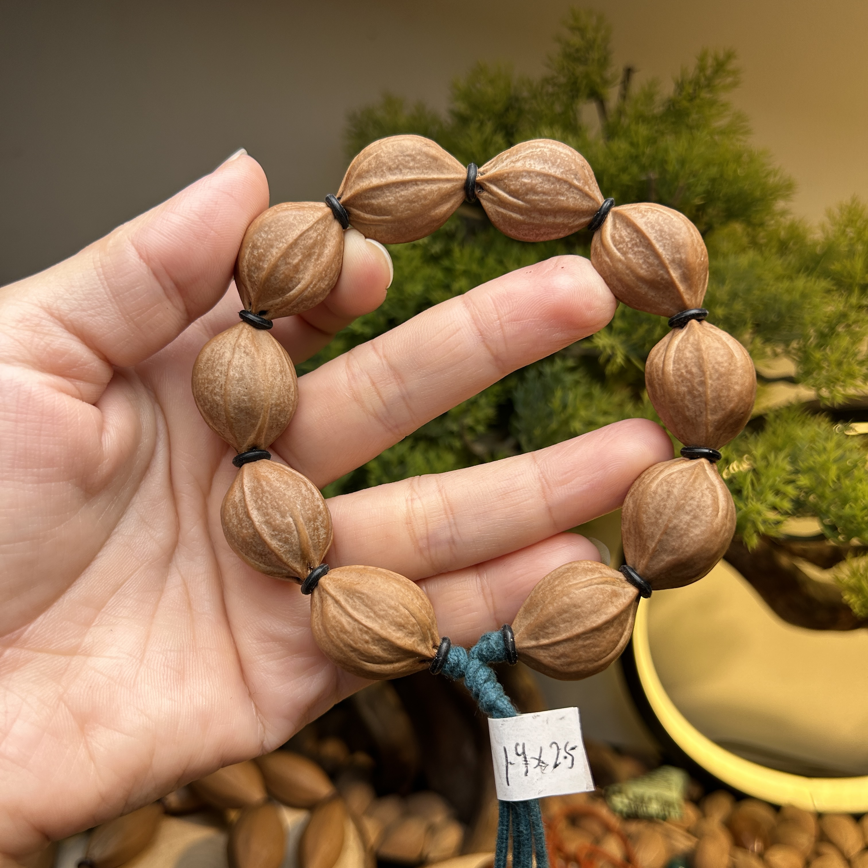 梅林四花铁核橄榄核1.9-25的手串