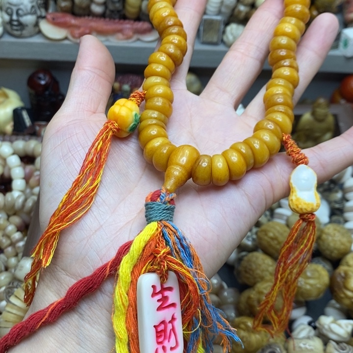 桃核吊坠驼骨。