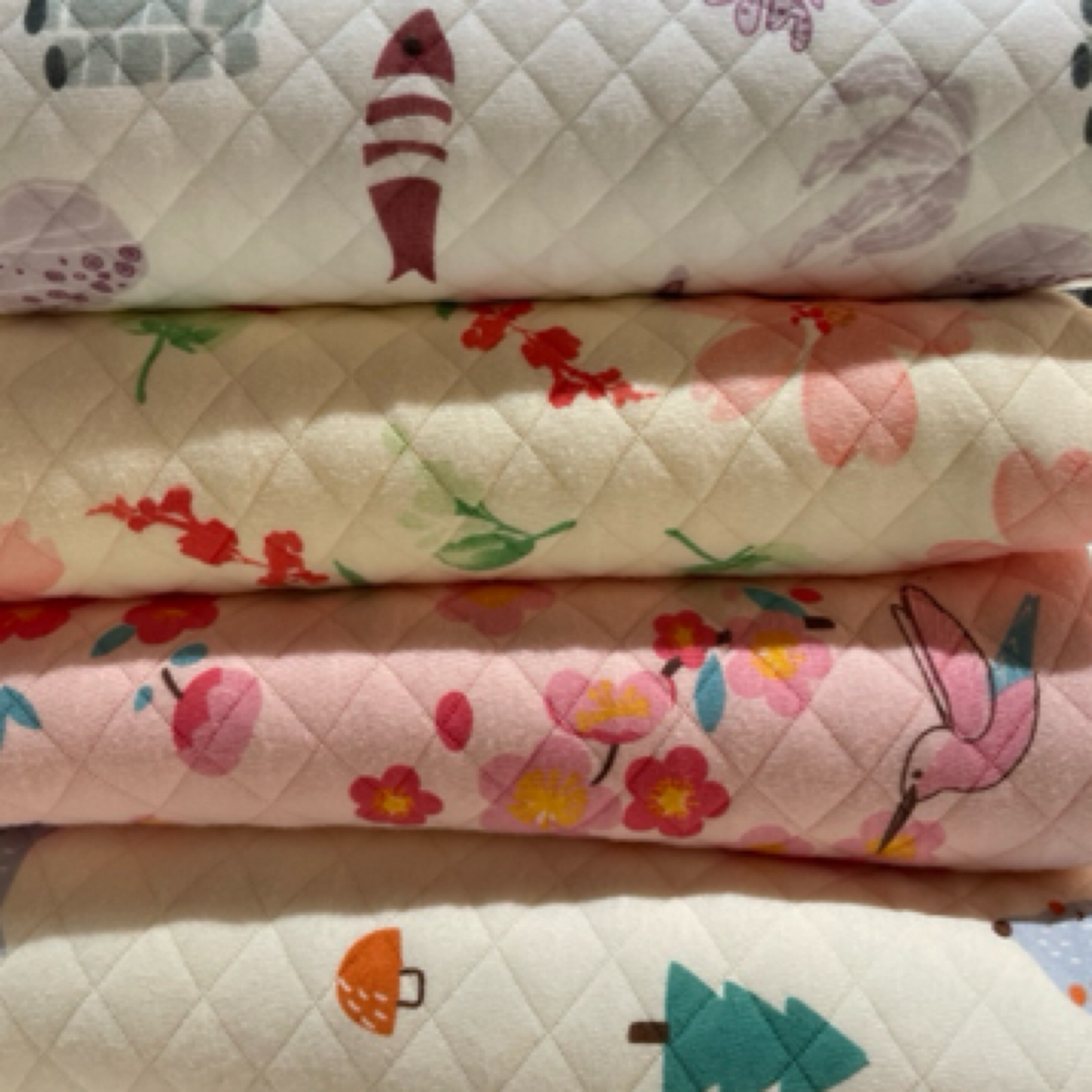 S级纯棉婴幼儿夹丝棉面料又称空气成里外纯棉婴幼儿包被贴身衣物