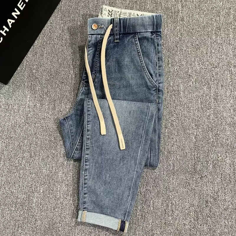 2025新款春秋松紧腰小脚牛仔裤男士宽松百搭微锥弹力修身九分裤潮