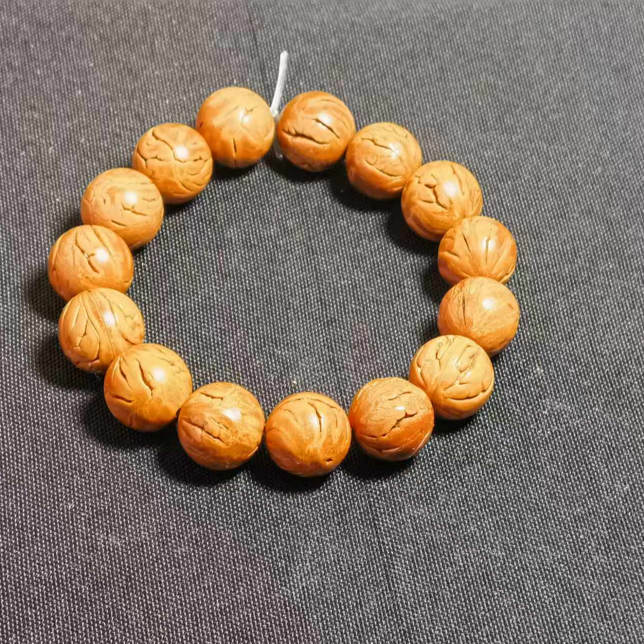 脑纹龙纹桃核光珠尺寸12.5-16.5mm