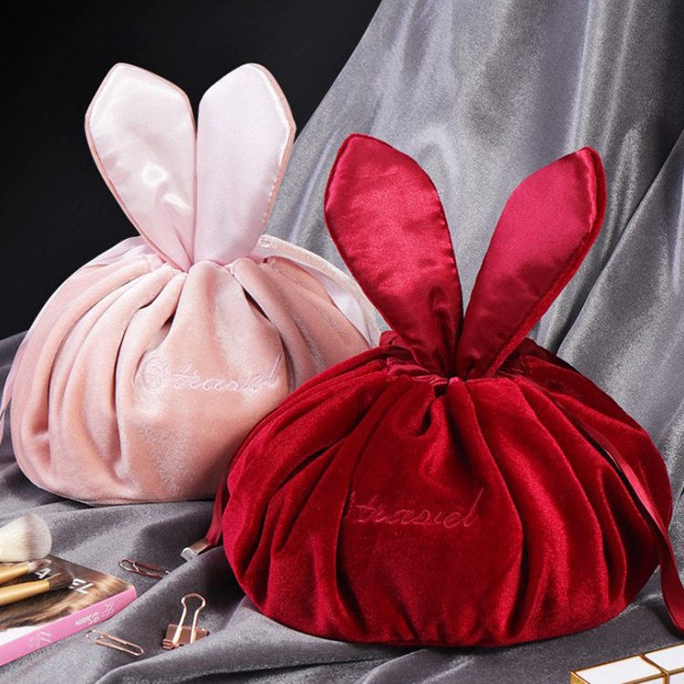 懒人化妆包兔耳朵大容量便携抽绳化妆品收纳袋袋子防尘家用简约