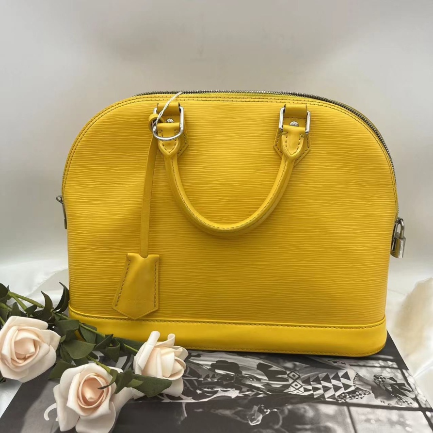 95新 LouisVuitton/路易威登 黄色水波纹贝壳630 2074