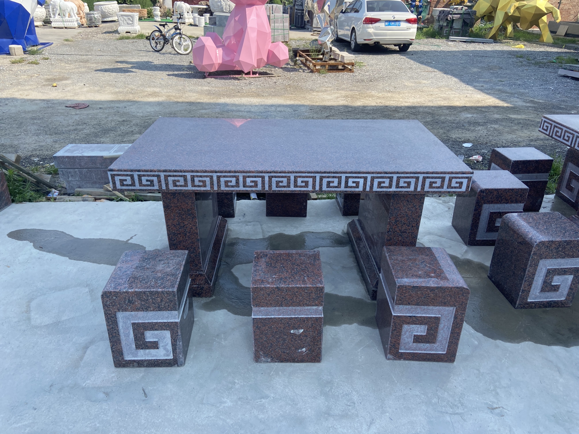 中国红石桌一米五乘以90厘米的一桌六凳