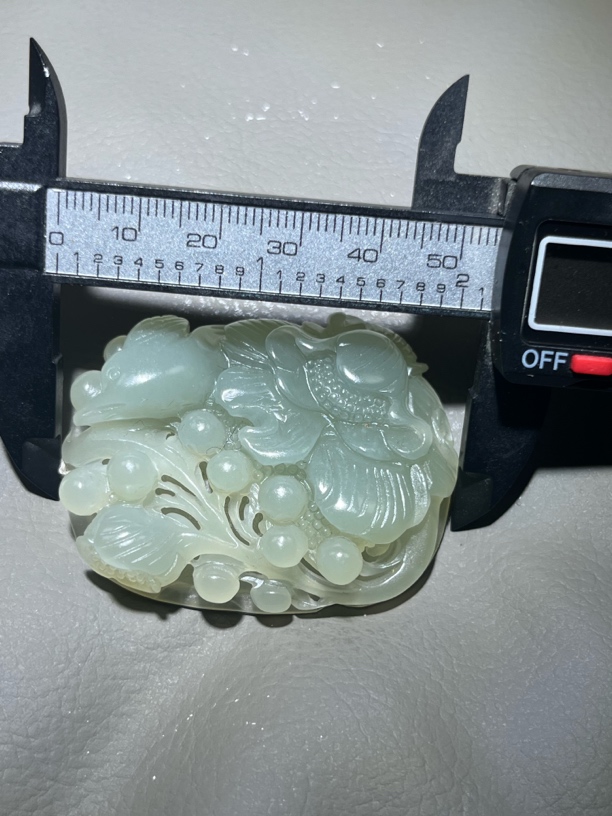 和田玉，凤凰戏牡丹，49克