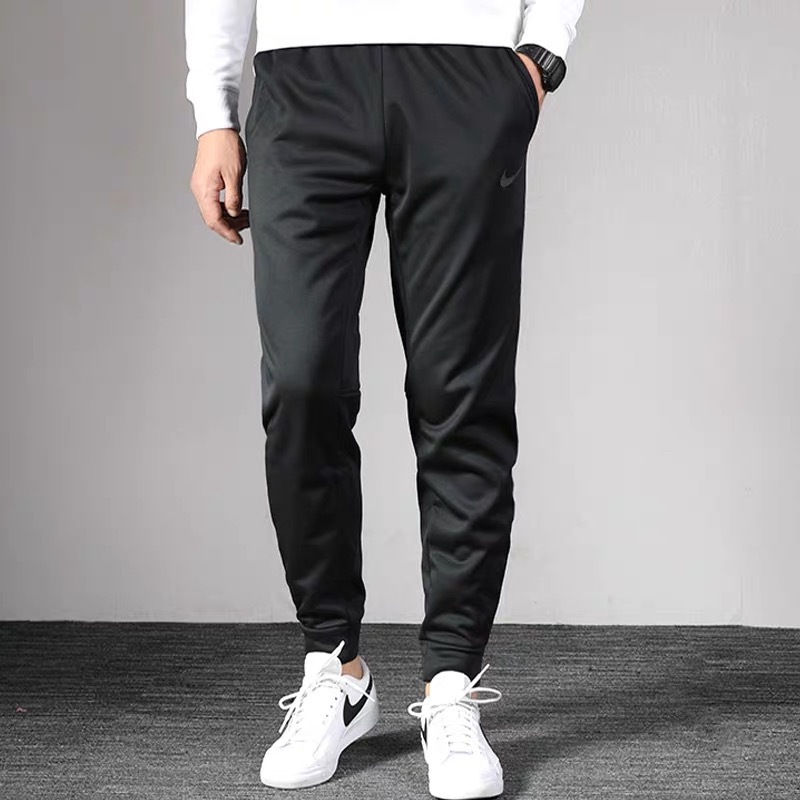 NIKE/耐克男裤秋季运动裤休闲裤加绒束脚长裤932256（55）