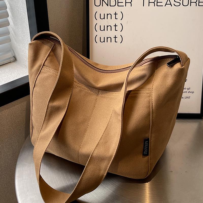 帆布包包女大容量2024新款时尚夏季百搭宽带斜挎包女士流行水桶包