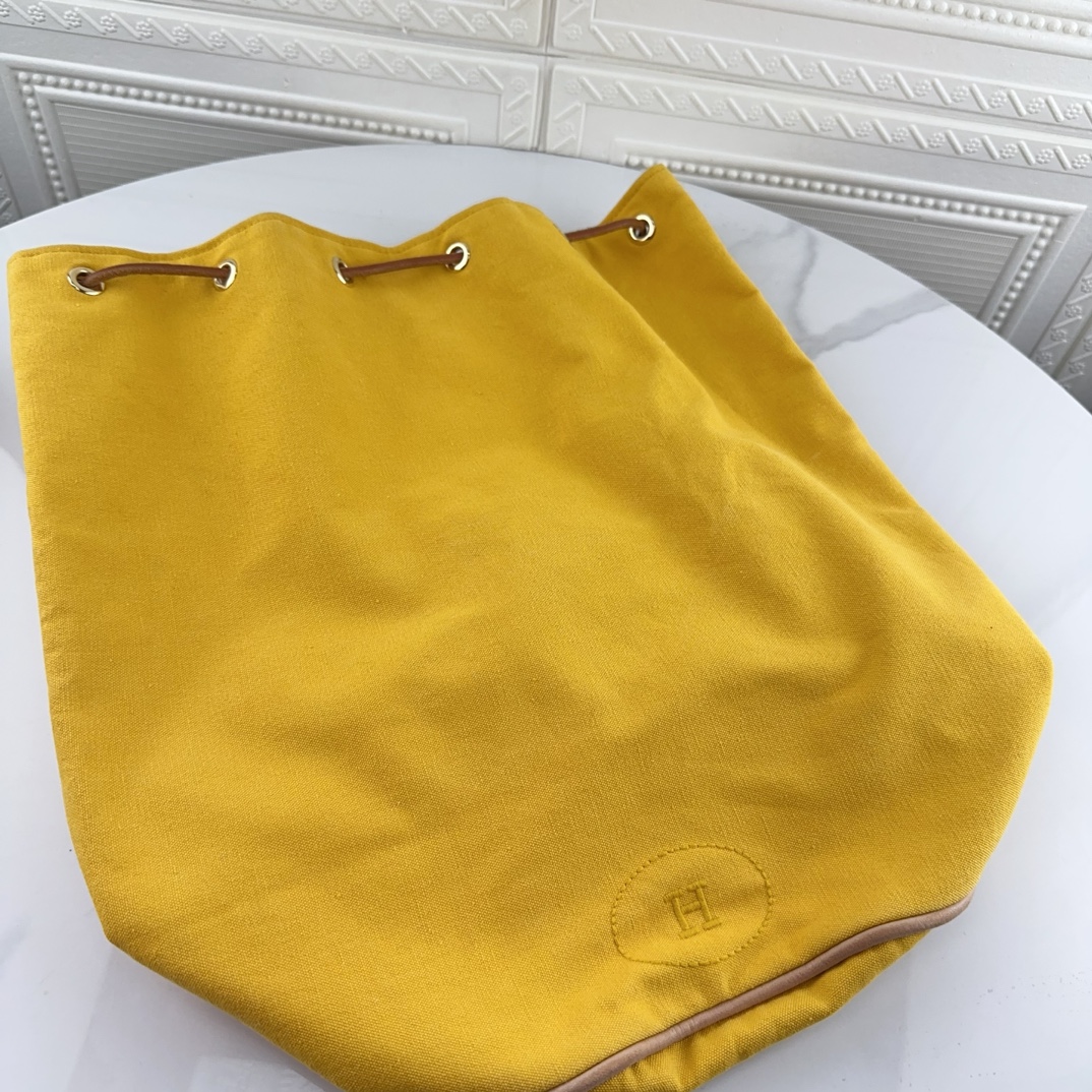 95新 Hermes/爱马仕 男女同款时尚中古黄色抽绳双肩包二奢包包