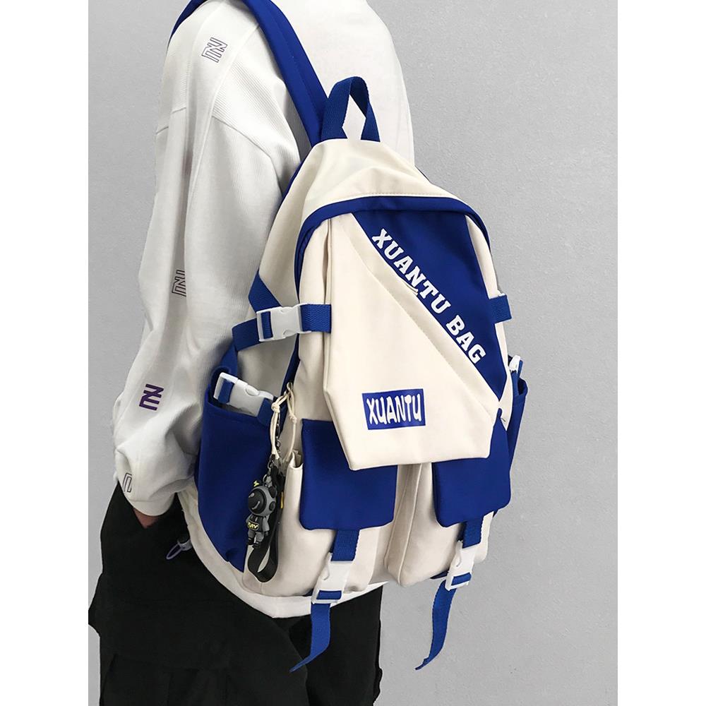 潮牌双肩包男工装休闲书包男生初中生背包高中大学生男士旅行包夏