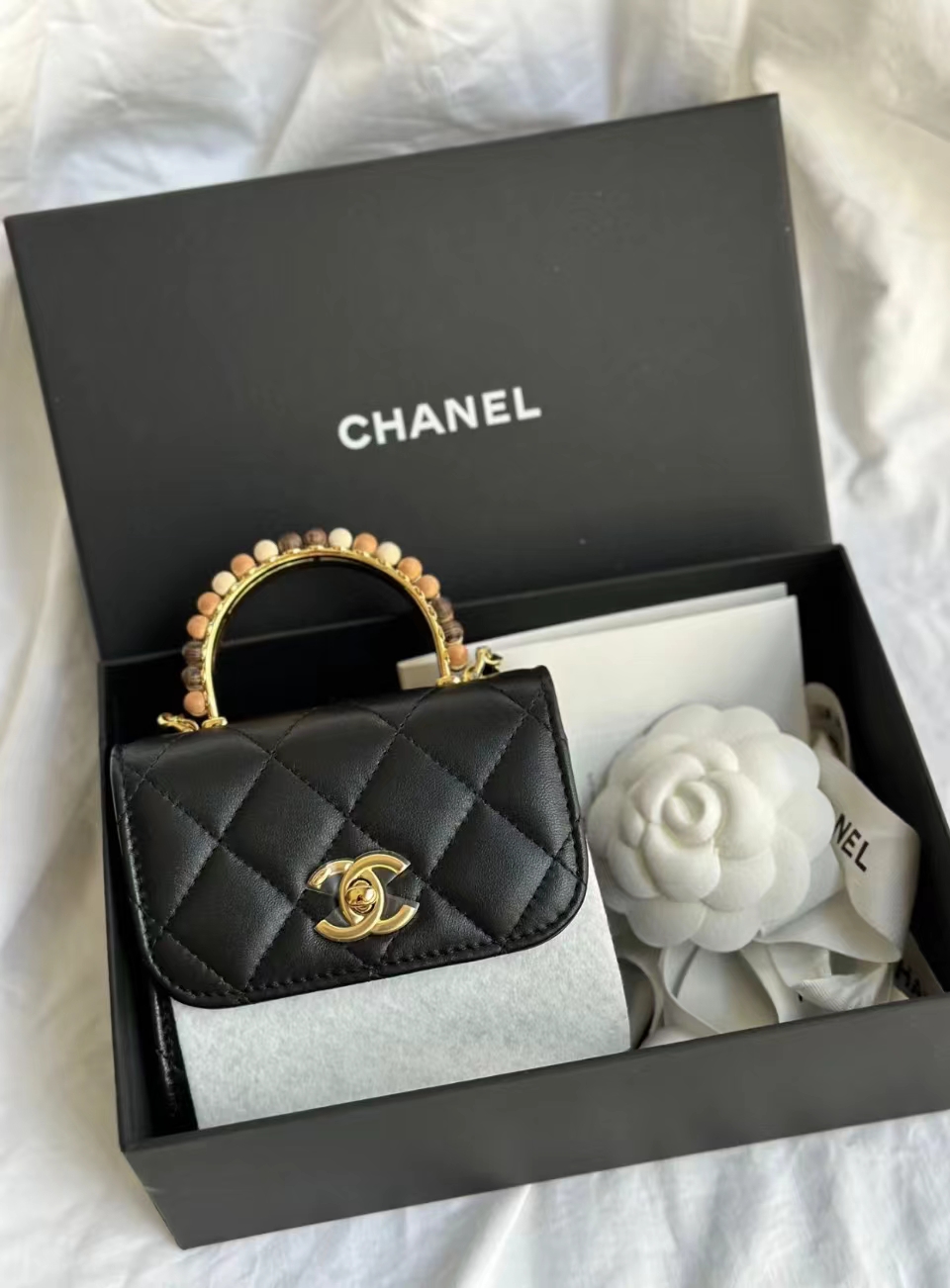 99新  Chanel 黑金木珠限定手柄 Kelly mini 口盖包 6815421