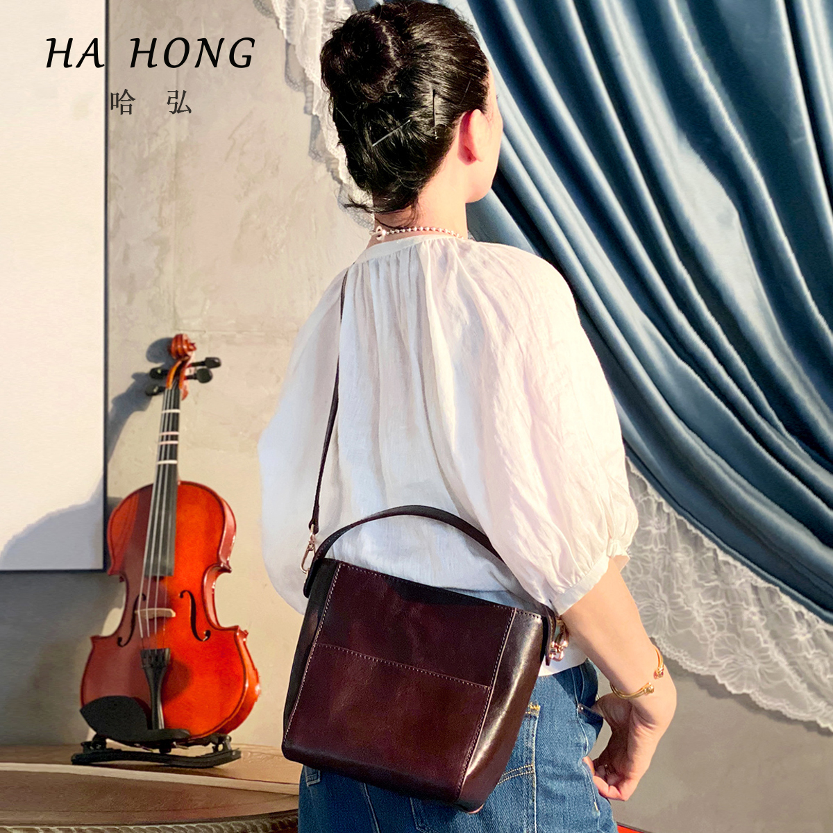 2025秋冬新款中号水桶包头层牛皮真皮小众复古设计手提单肩斜挎包