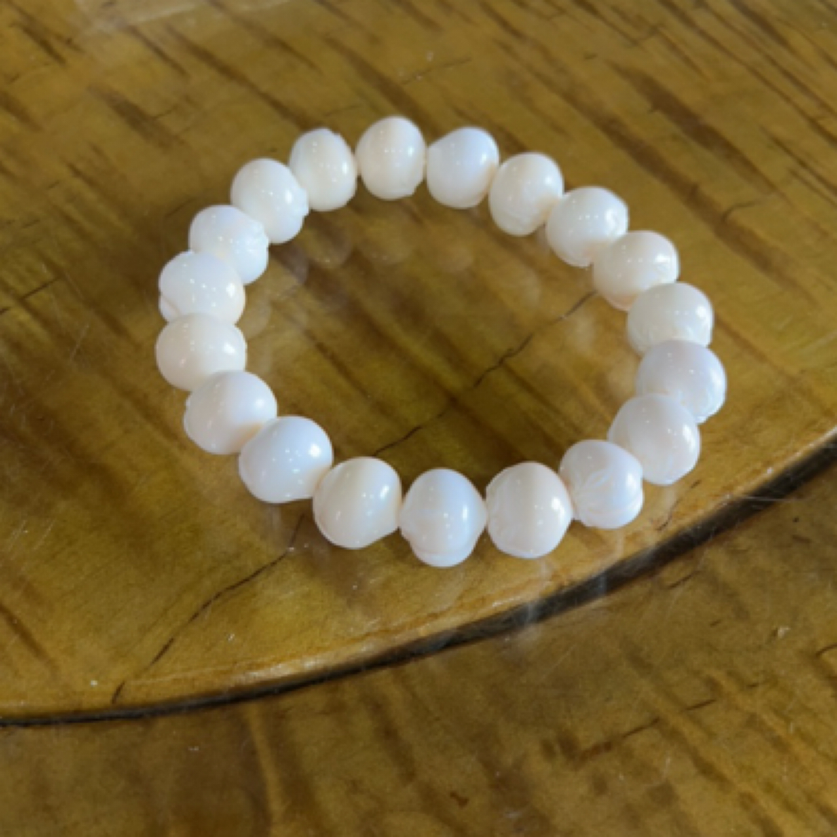 橄榄核雕刻约26.9克12x11手串hm102