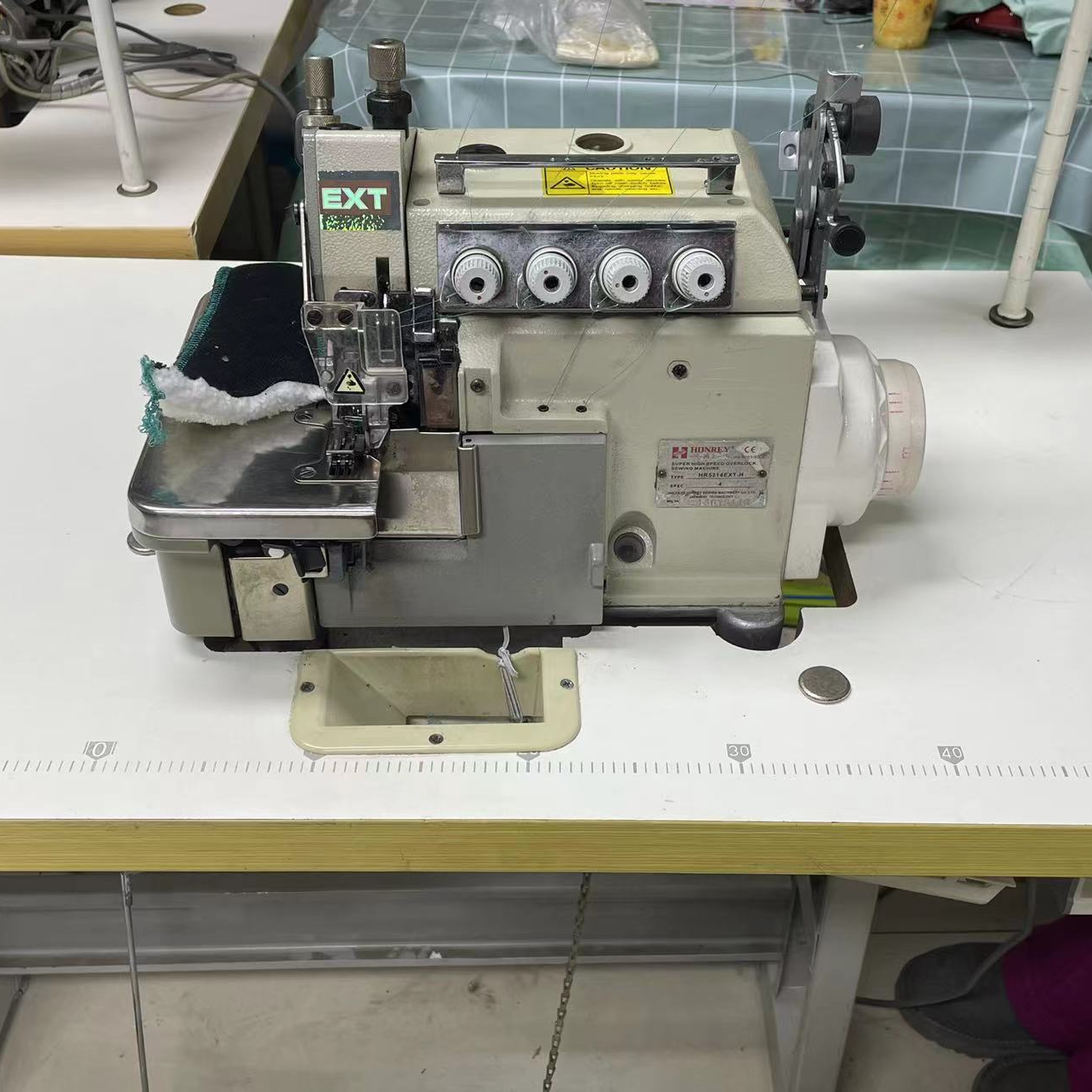 EXT同步四线锁边机