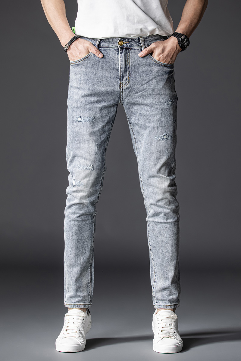 秋季欧洲站牛仔裤男重工假破洞潮牌帅气休闲修身小脚长裤91302