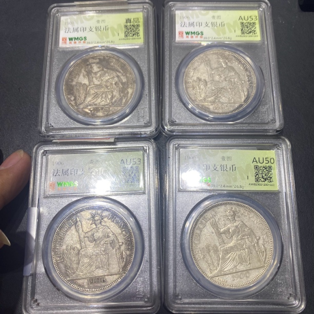 2闻德评级坐洋银币