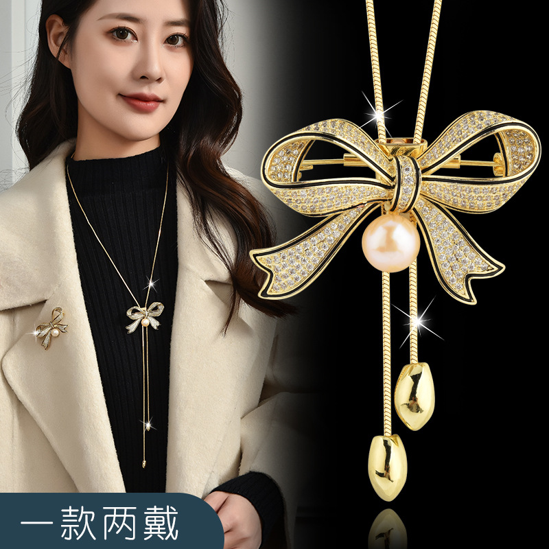 K755 金色蝴蝶结流苏毛衣链【胸针两戴] 