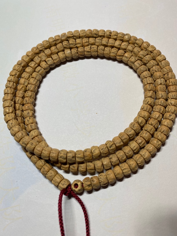 热振百香籽高油高密黄油皮多棱顺纹药片