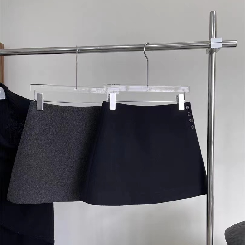  简约纽扣设计a字半身裙女2025新款秋冬季高腰显瘦包臀毛呢短裙子