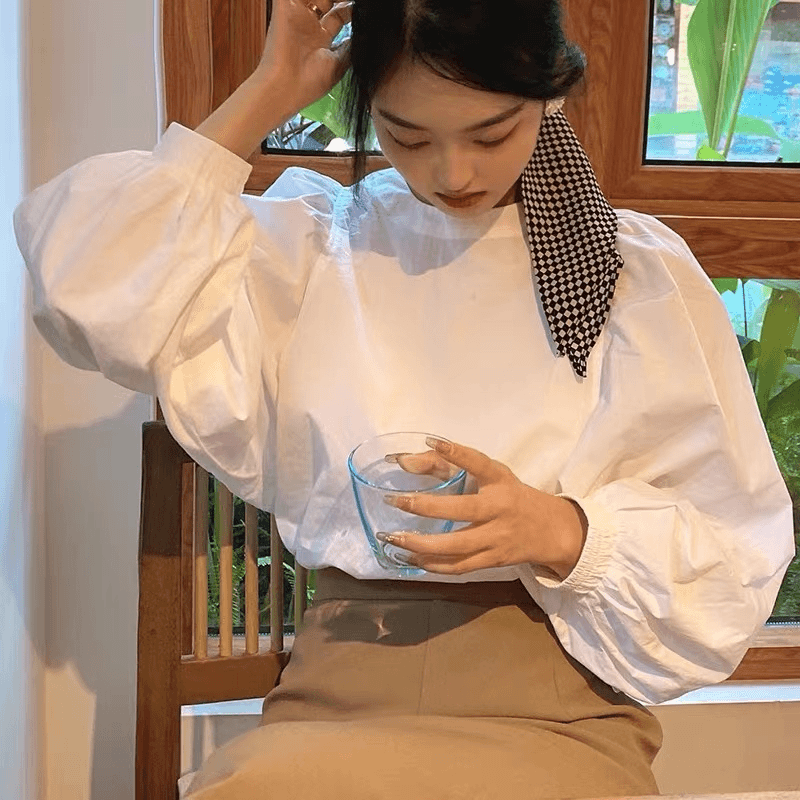 法式宽松白色泡泡袖衬衫女秋复古洋气别致甜美设计感小众圆领上衣