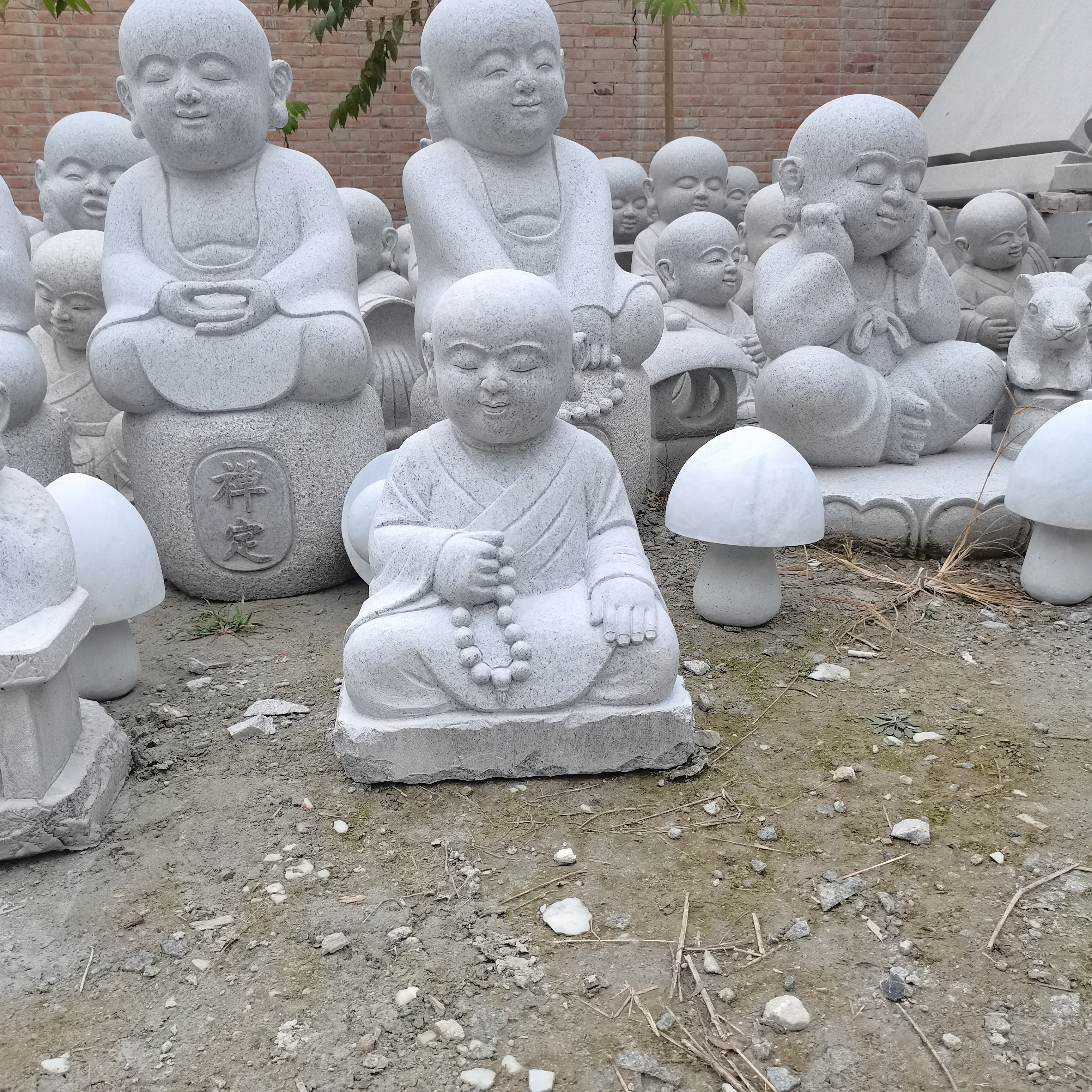 石雕小沙弥石雕小和尚花岗岩小沙弥支持定做