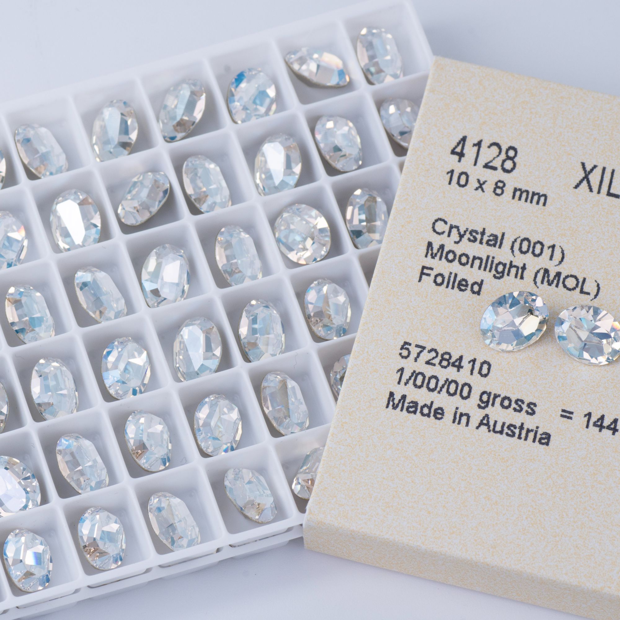 花式石 4128鸽子蛋 10*8MM 001MOL月光白 华子美甲钻奥地利水晶