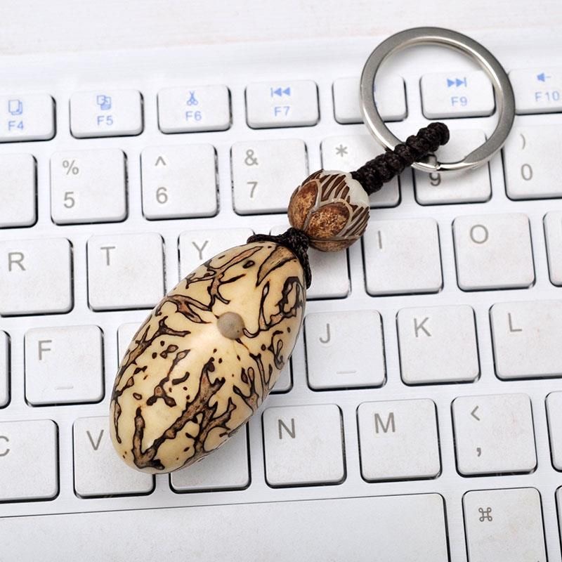 千眼菩提迷你白果手工打磨实心天然木质把玩件