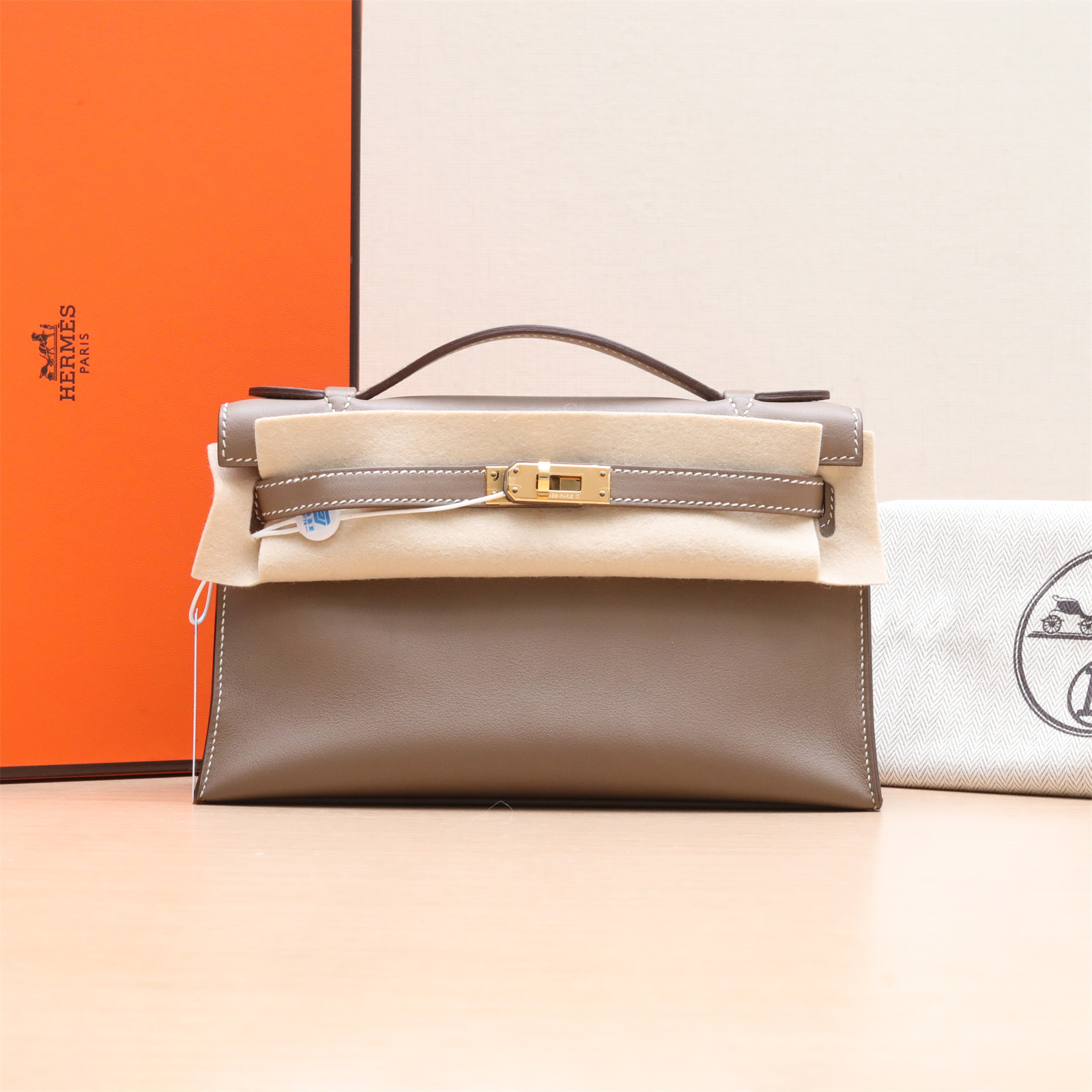 99新 Hermes/爱马仕 小花6枫MINI KELLY 一代 大象灰 X刻 金扣包