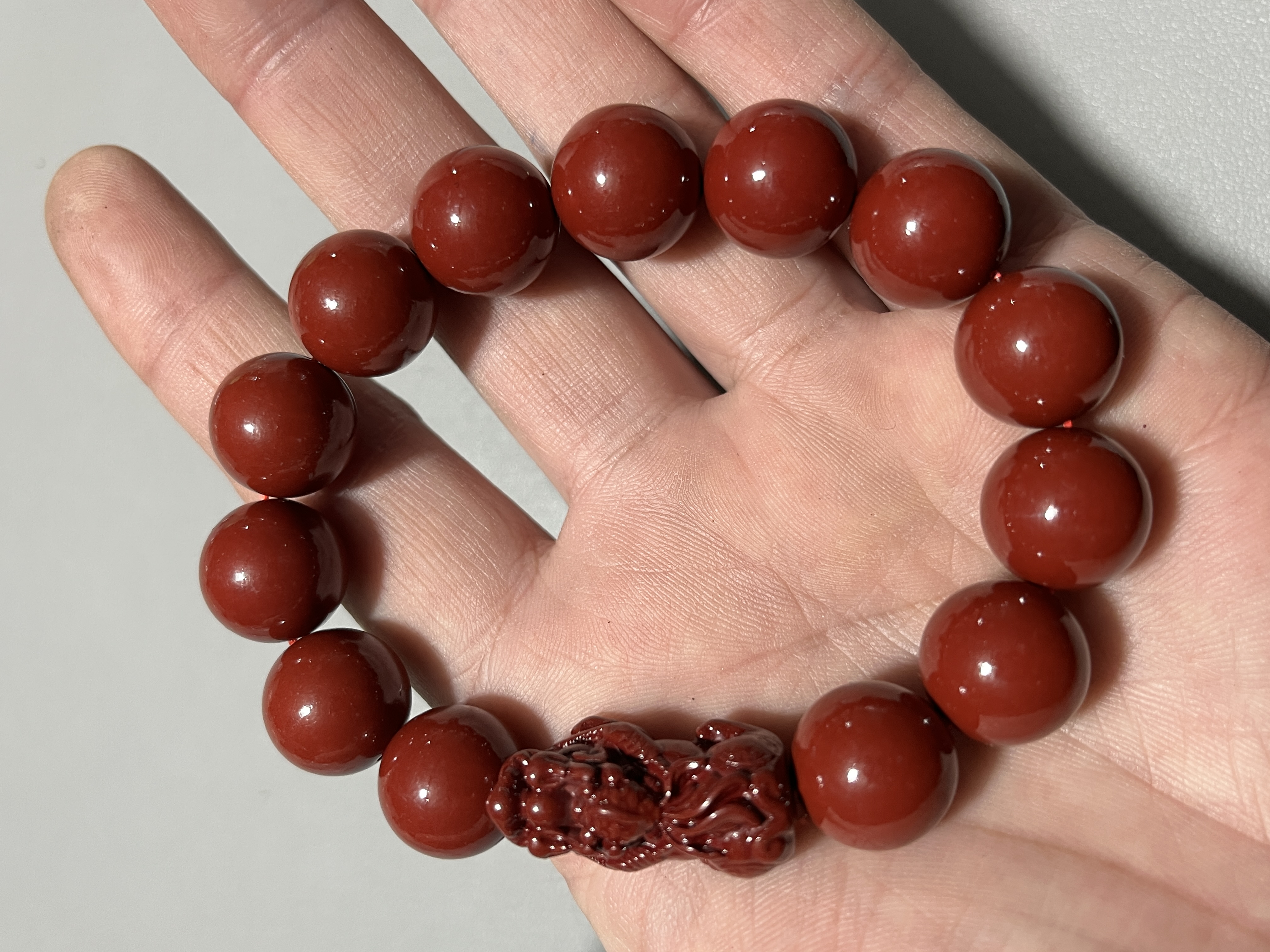 天然辰砂C54朱砂1.4圆珠貔貅款单圈手串