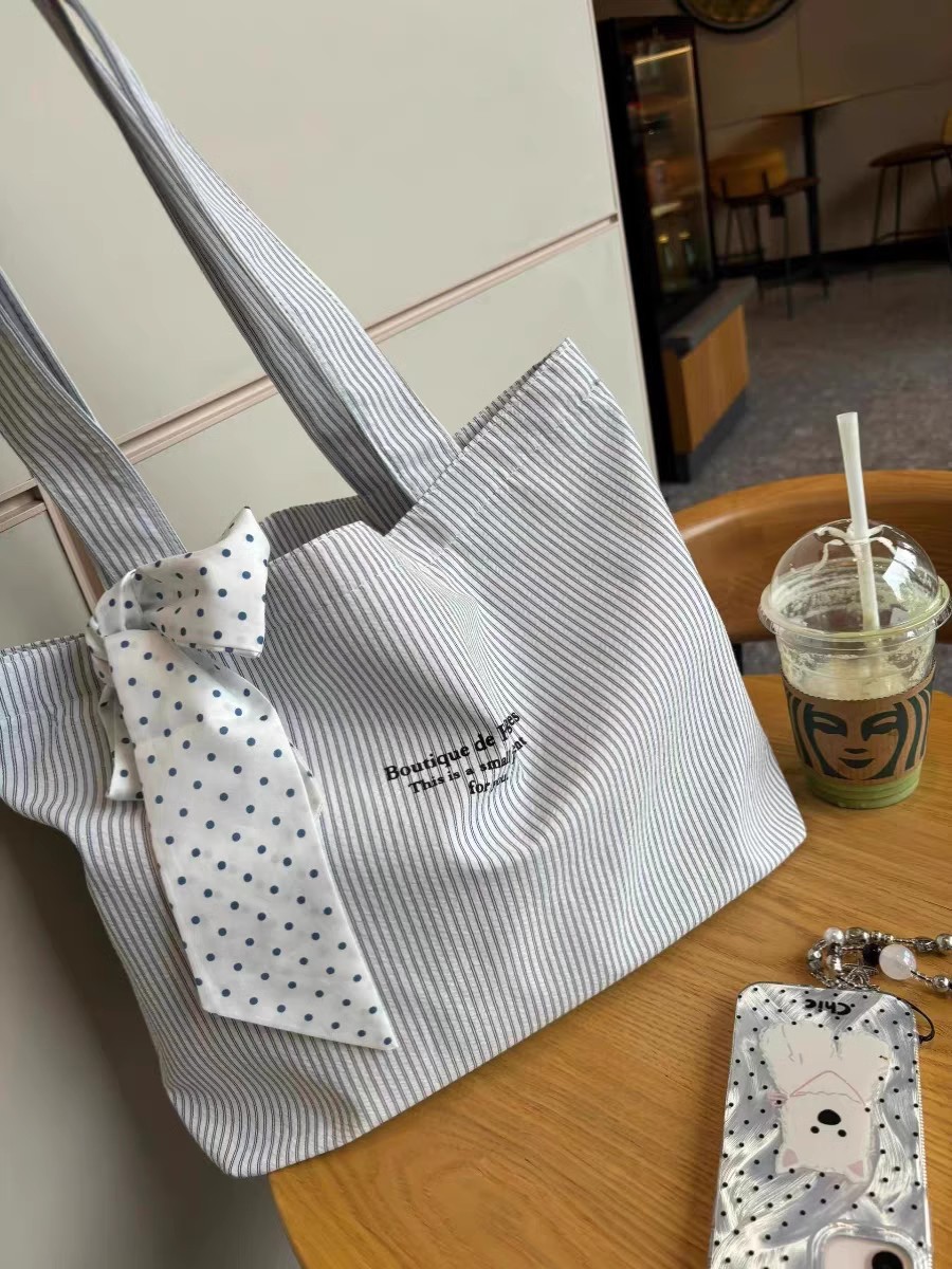 2024新款简约休闲大容量帆布包小清新条纹字母单肩包随性文艺布袋