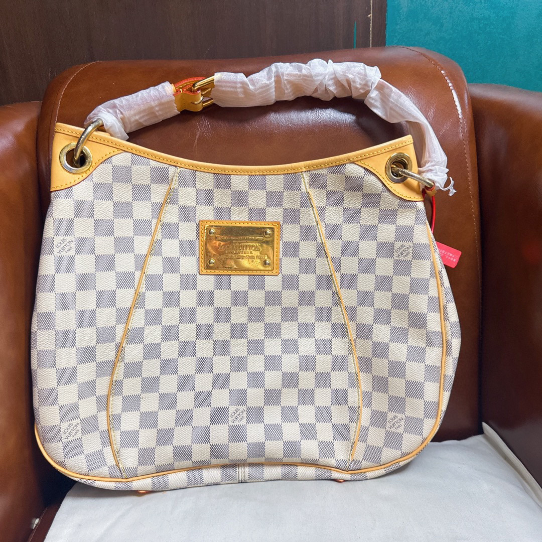 修复品白棋盘格金牌南瓜中号，单肩斜挎
