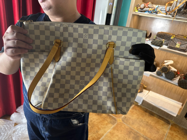 修复品白棋盘奶瓶，单肩斜挎