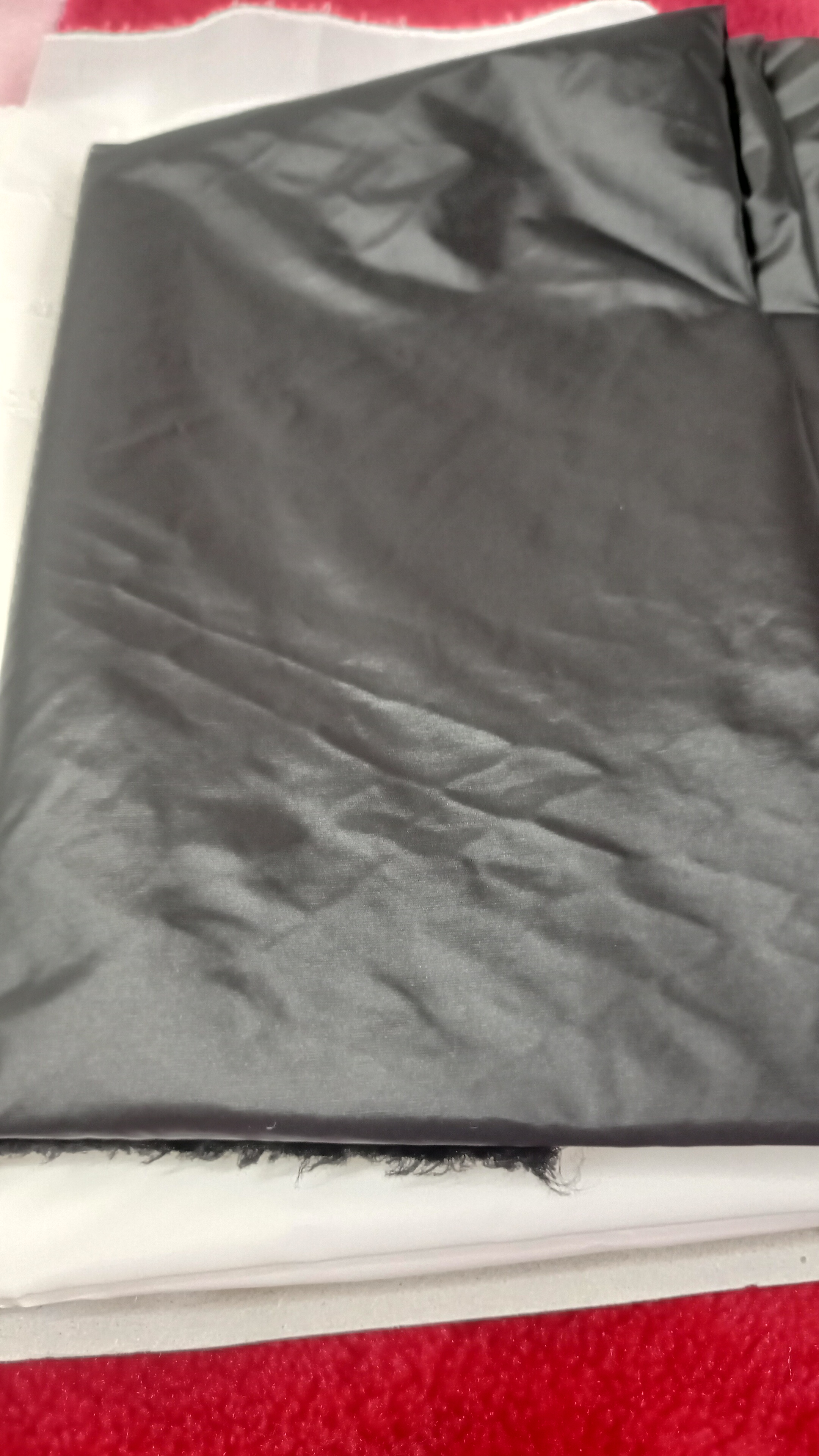 轻薄款高定黑金羽绒服布料面布