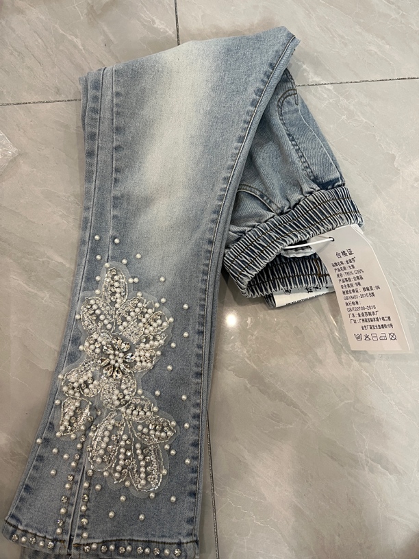 重工订钻水洗牛仔裤