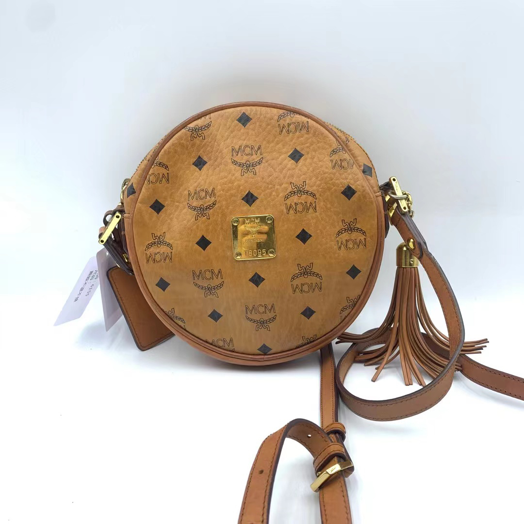 95新 MCM 单肩圆饼包 6155