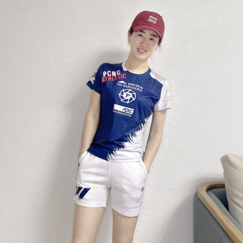 夏季新品羽毛球服男女运动比赛服情侣款套装上衣白短裤速干团队服