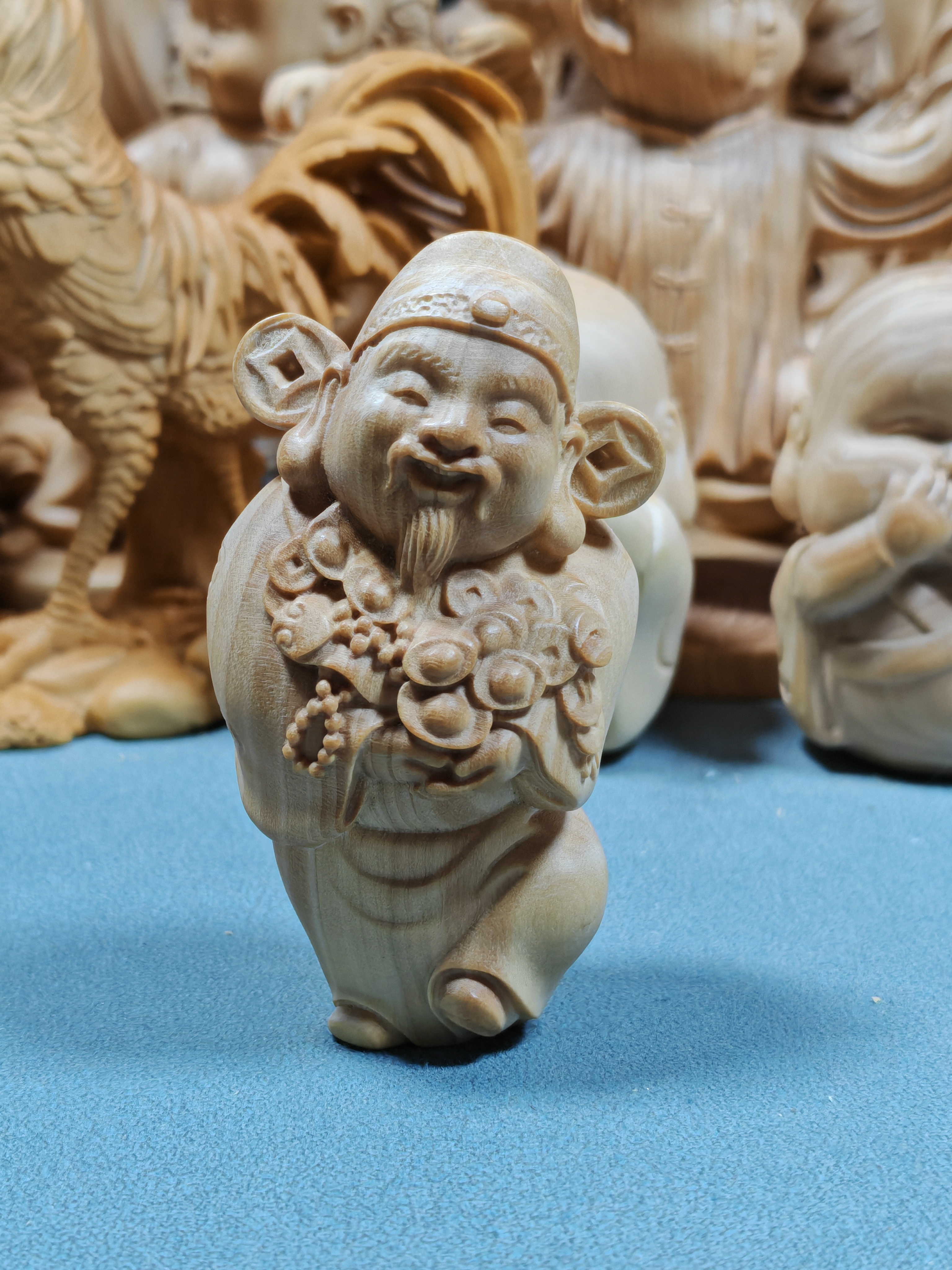 一物一拍小叶黄杨木雕财神手把件